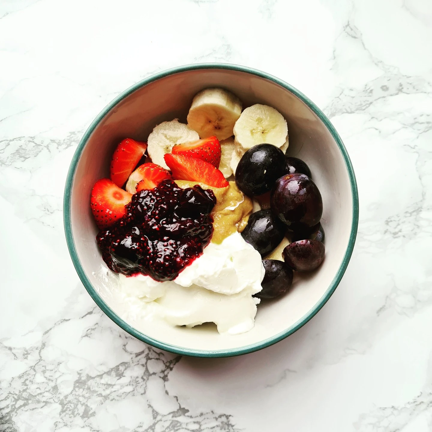 Fresh yoghurt bowl with berries and compote