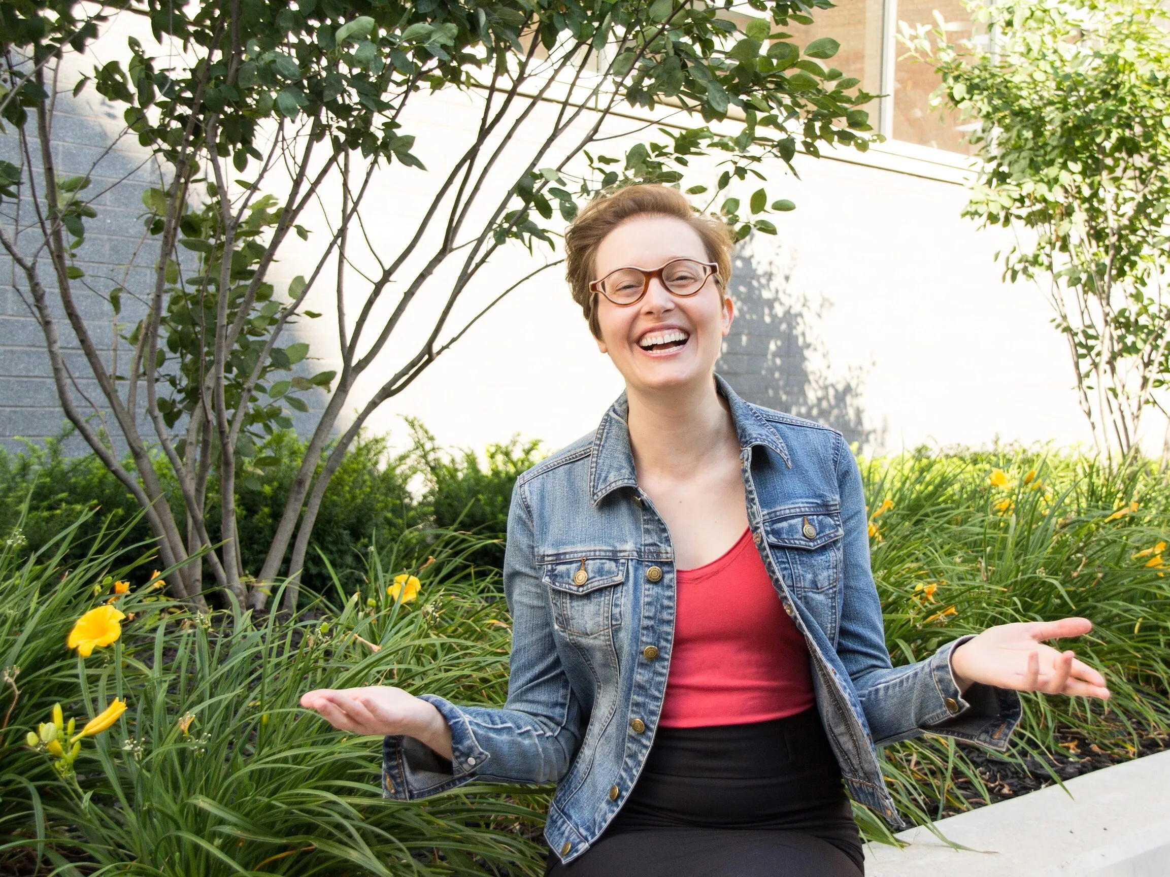 Jen Polk, PhD, laughing outdoors